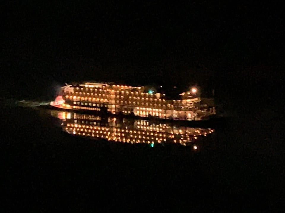 Paddlewheelers and towboats also light up the night!
