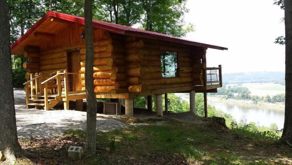 The Hawk's Nest is a hand-crafted log cabin overlooking the Ohio River.