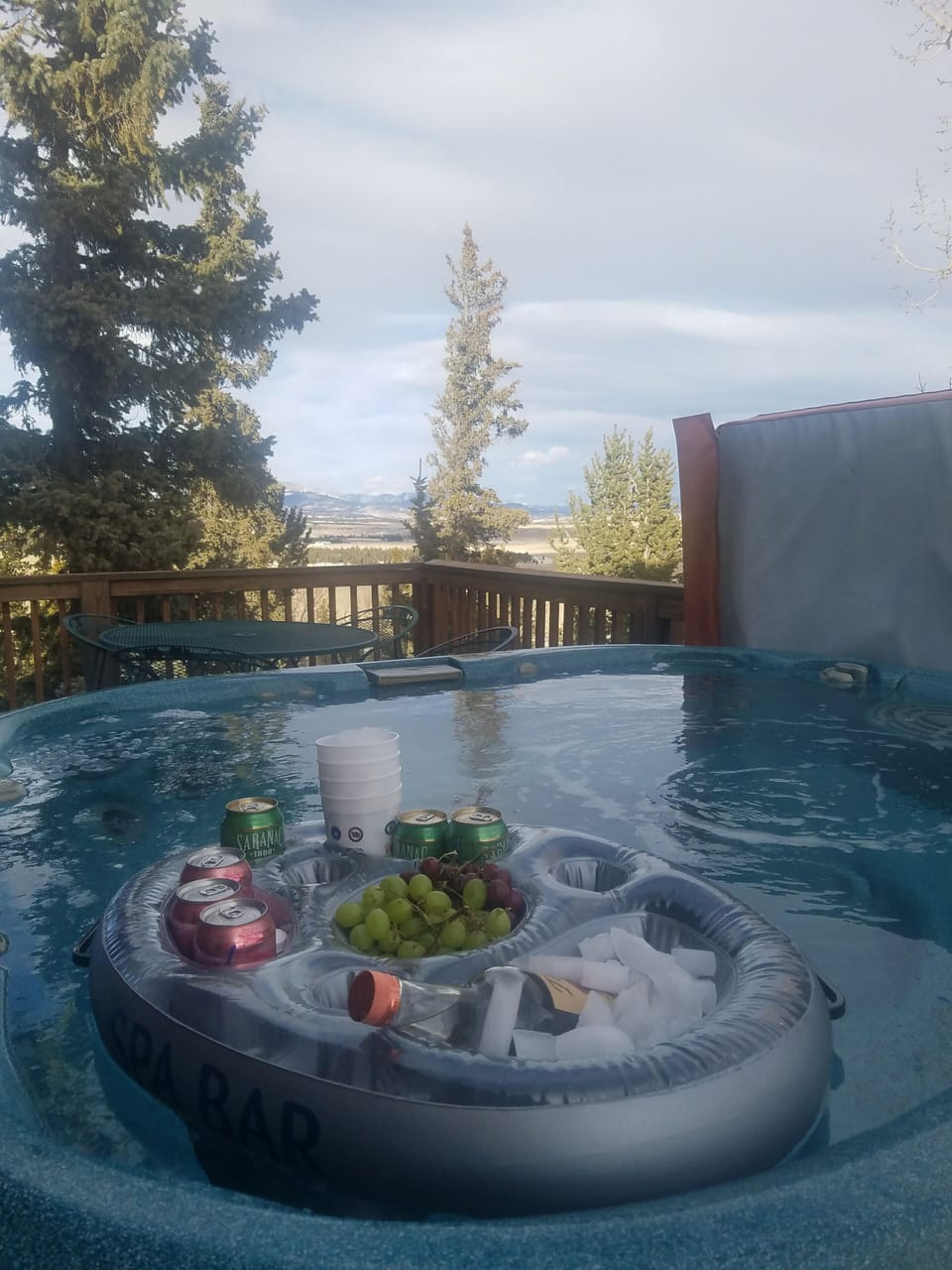 Hot tub located on the wrap around deck providing amazing views.