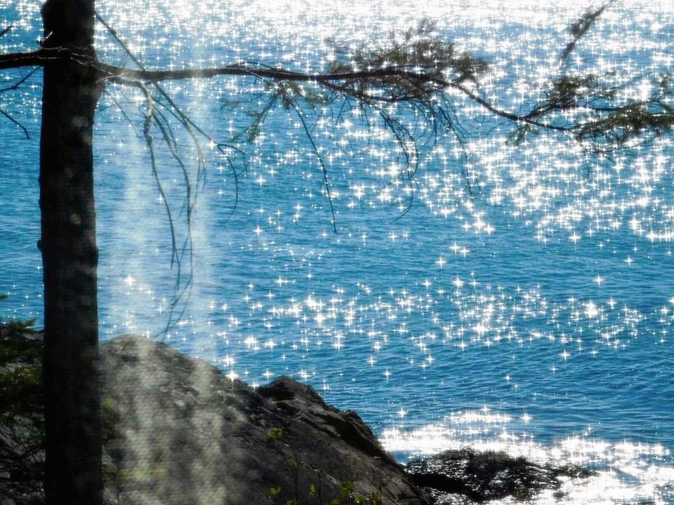 When the water is calm, the sun creates diamonds of light as far as you can see.