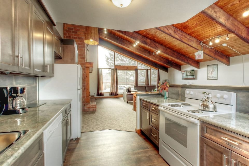 Fully equipped kitchen sitting and dining area - open concept upper floor