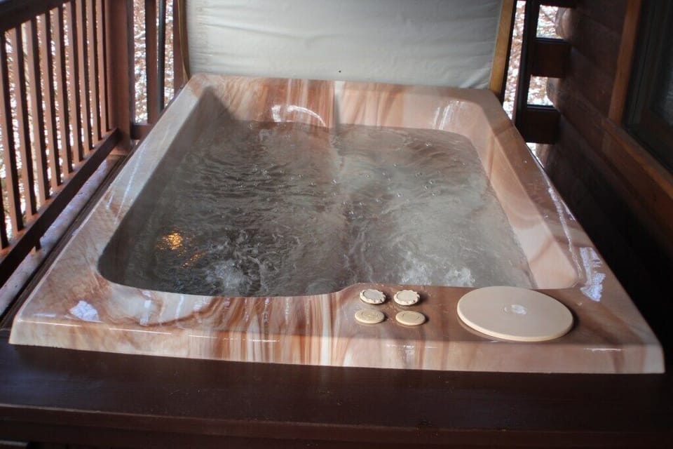 Take in the mountain view while soaking in the Hot Tub