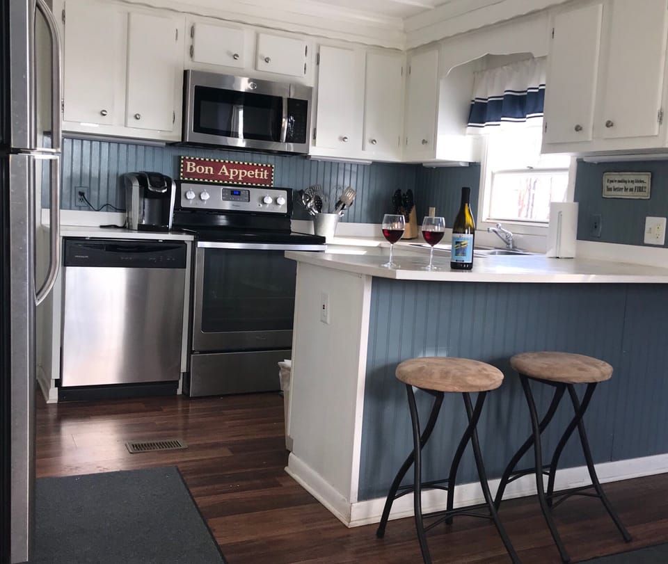 Up to date, fully stocked kitchen. 