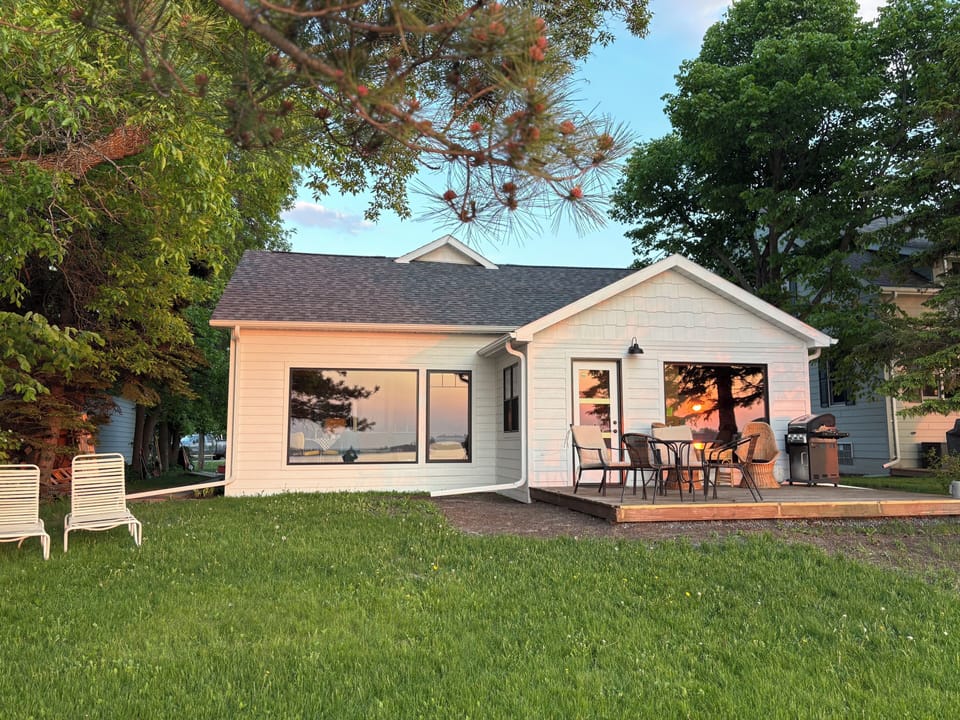 Backyard of property faces Canada across Sand Bay on Rainy Lake. 