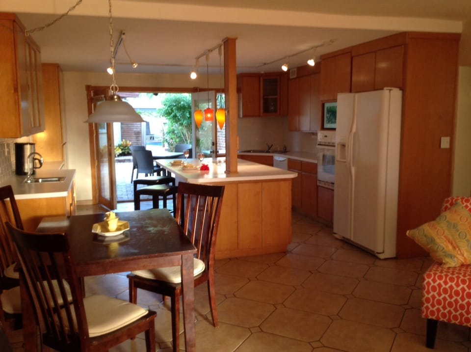 Open floor plan with living dining and kitchen area, perfect for entertaining.