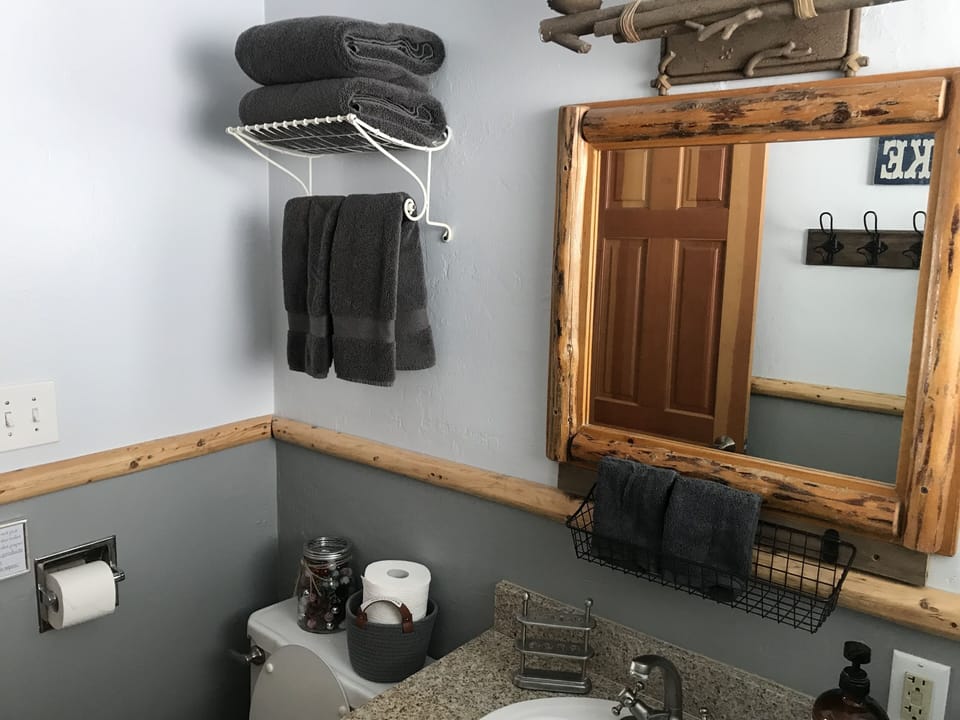 Upstairs Bathroom with bath tub and shower off the hallway