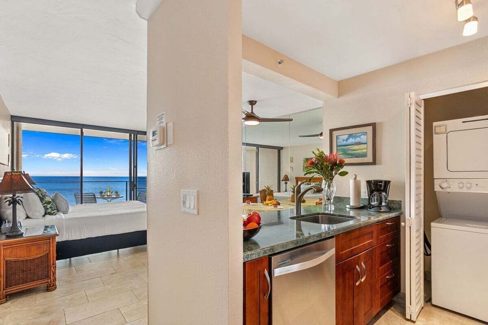 Prepare meals while enjoying stunning ocean views from this modern, fully equipped kitchen