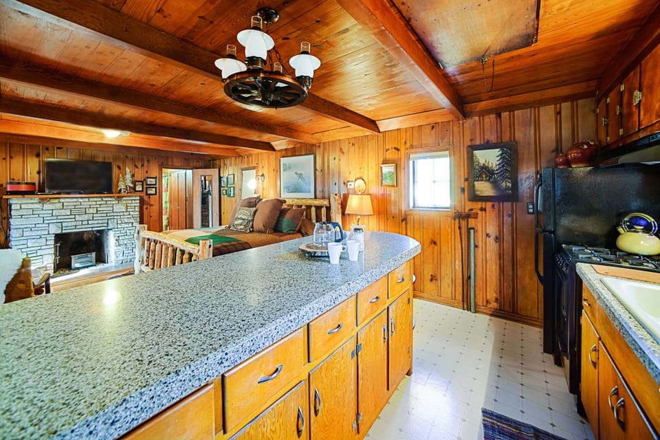 stocked kitchen with gas stove