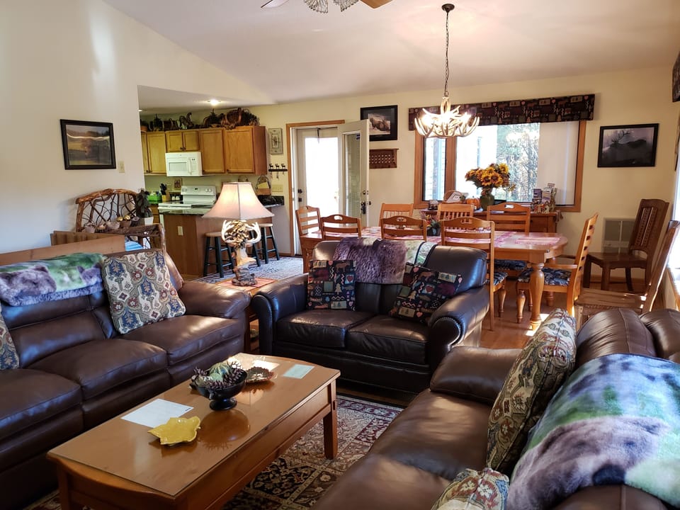 Living Room with gas fireplace, Dinning Room & Kitchen (open) hardwood floors