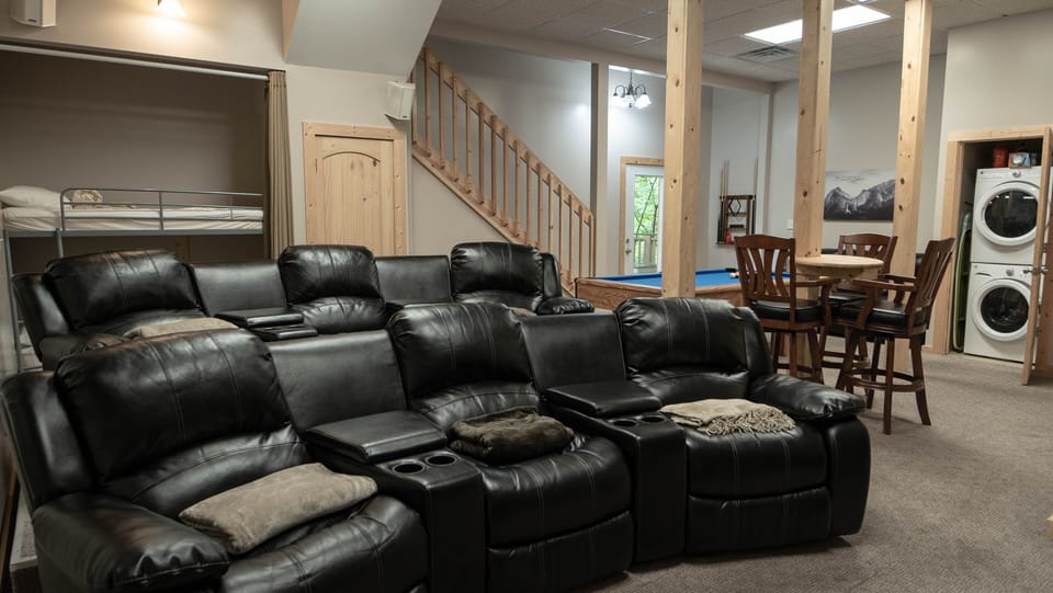 Theater room, pool table, bunk beds and full size washer and dryer.
