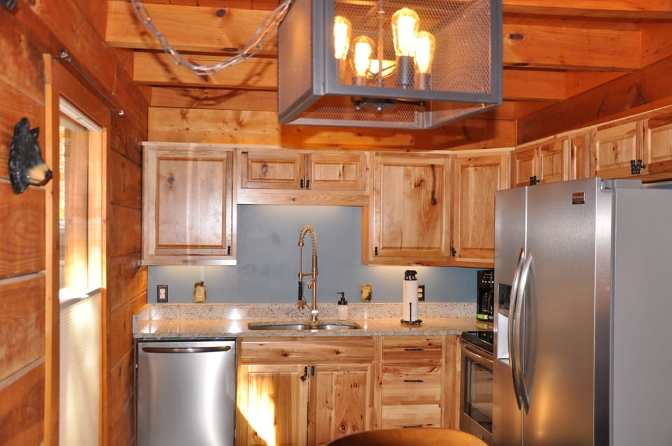 The view of the kitchen from the Dining room table