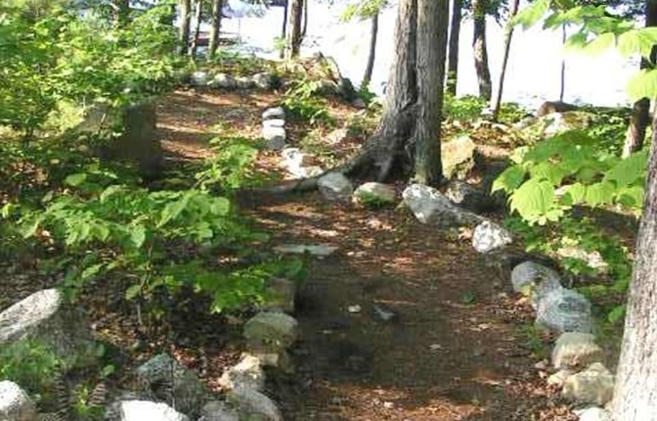 Trail from house to private beach & dock.