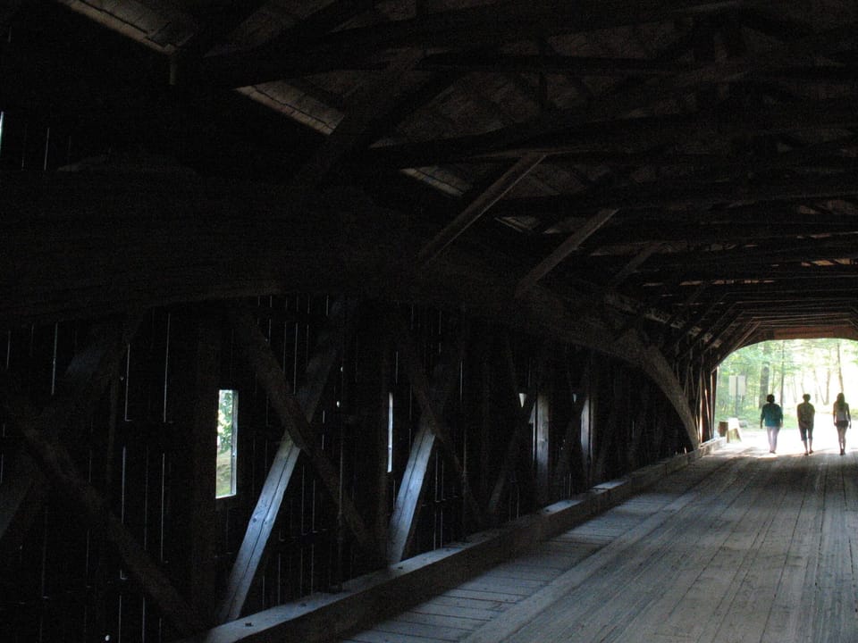Unusual covered bridge design.