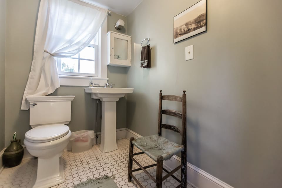 one of two half baths (main house)