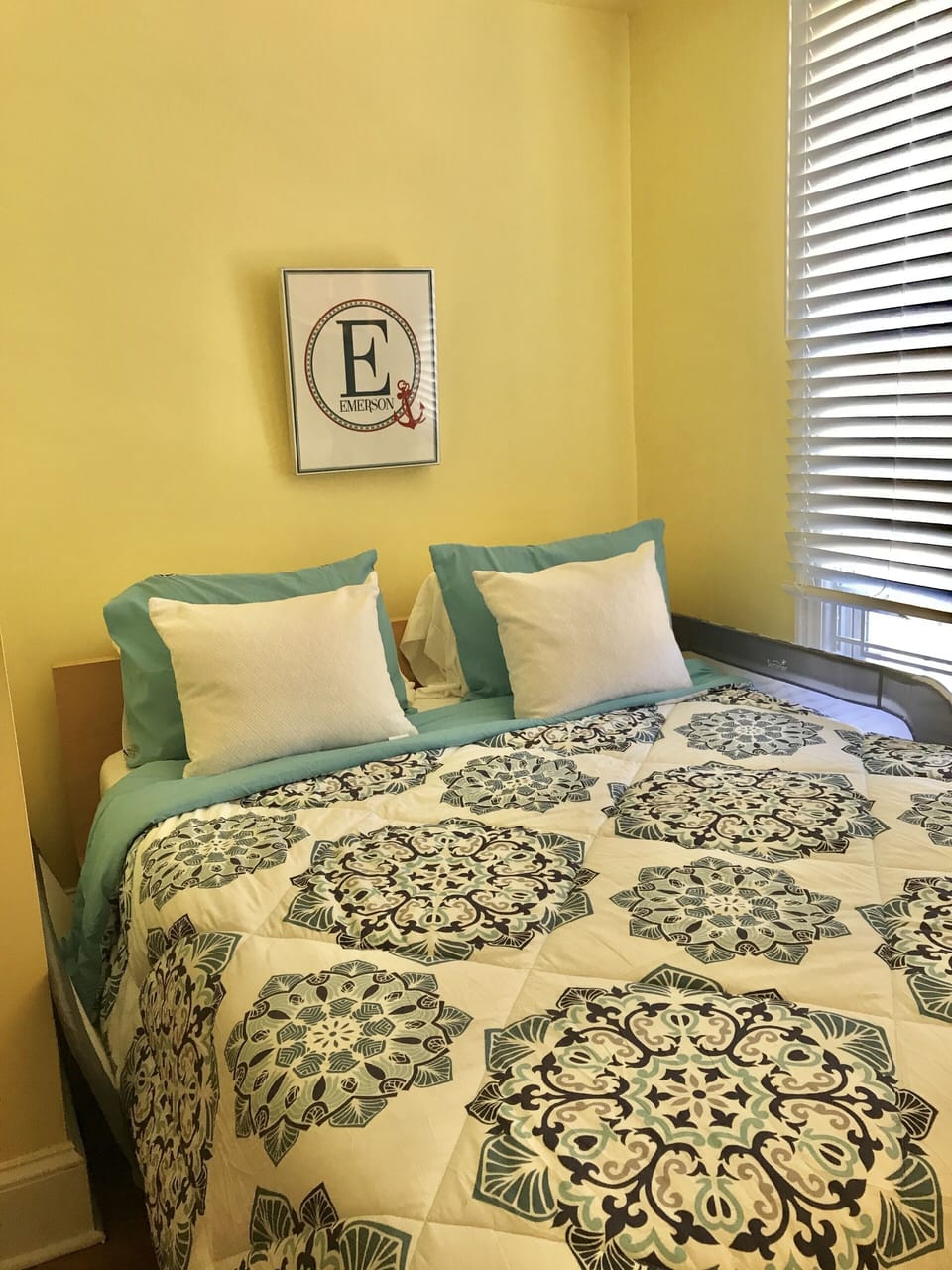 Bedroom 6. 3rd floor. Queen bed and crib. 