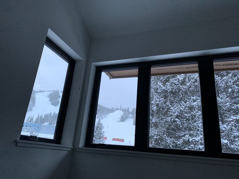 Queen bedroom ski slope view