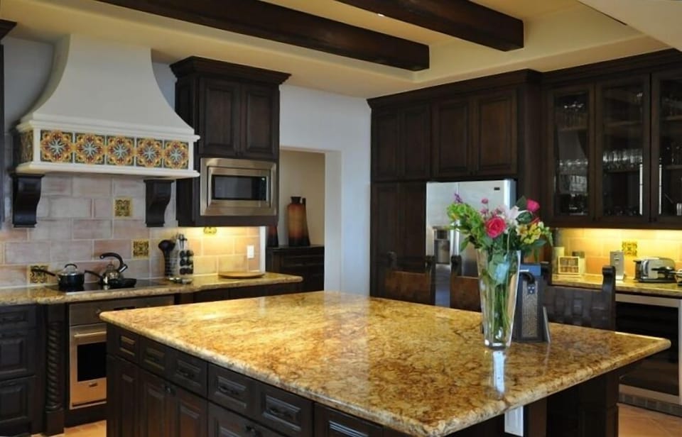 Spacious Open Kitchen with Granite Counter Tops and Stainless Appliances