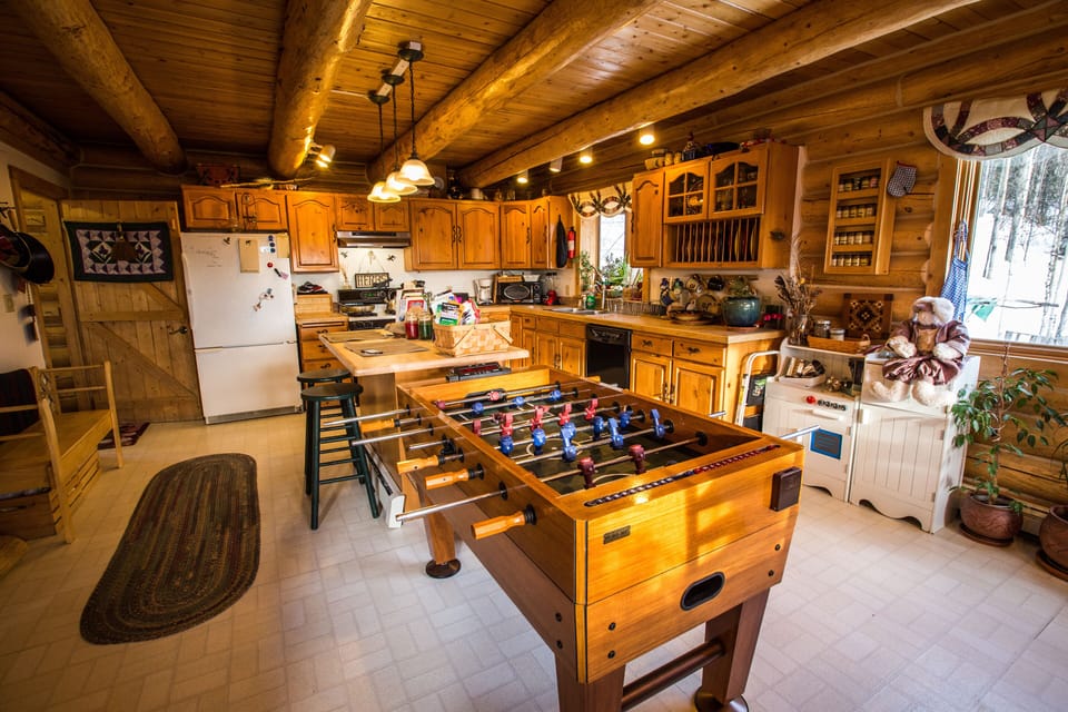 Dining area with Foosball table & play kitchen for kids 