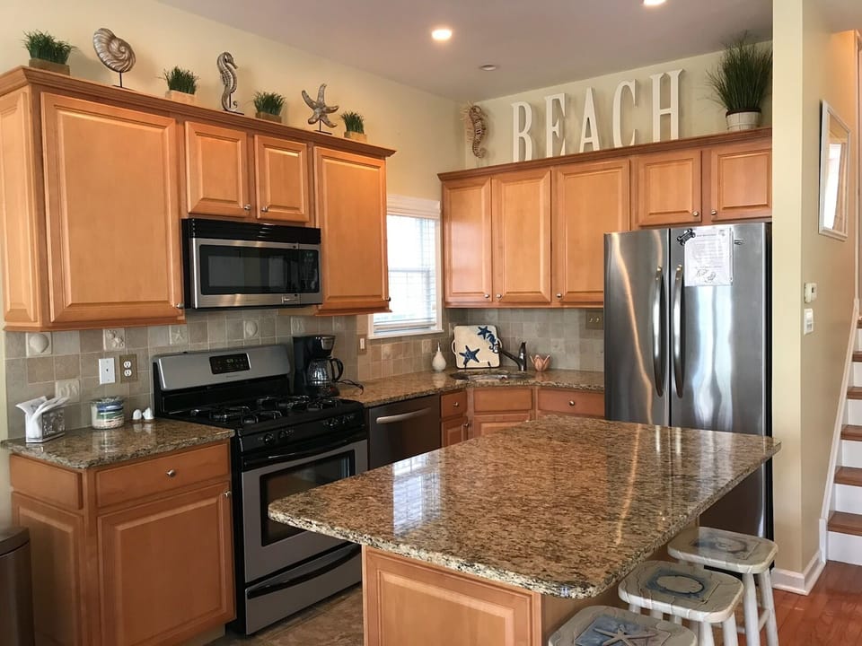 Kitchen with granite counter tops.
