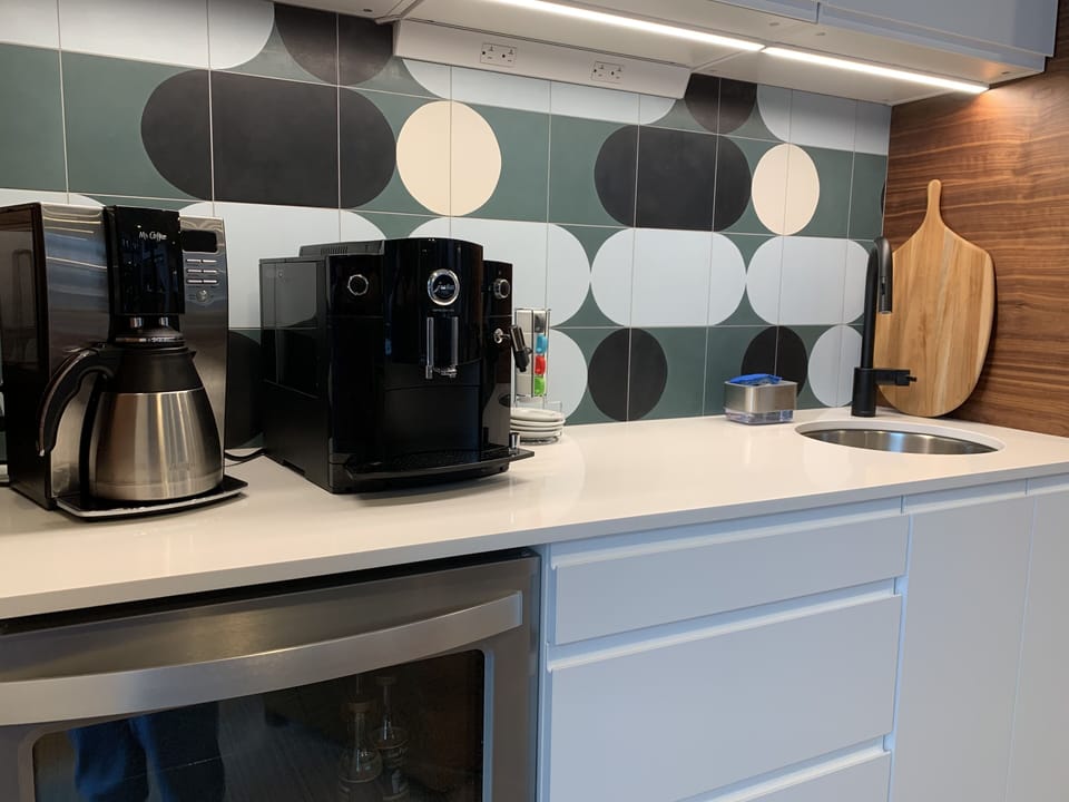 Our new bar & coffee station with drip and espresso machines & a beverage cooler