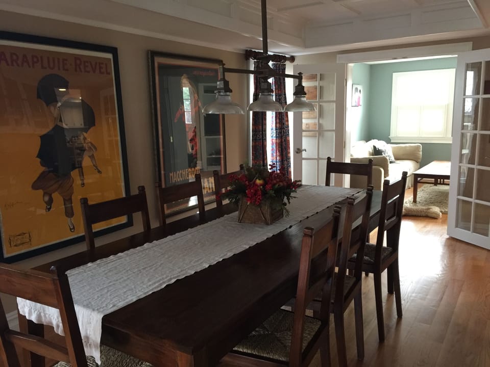 dining room with French doors leading to den/playroom