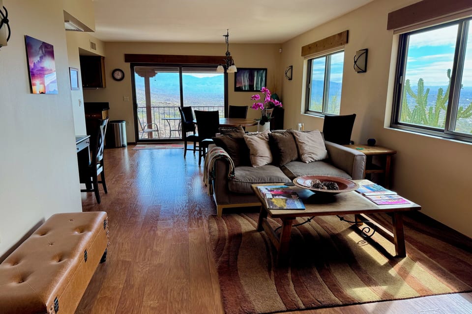 Small Living room, dining off of kitchen, east deck, desk, fireplace