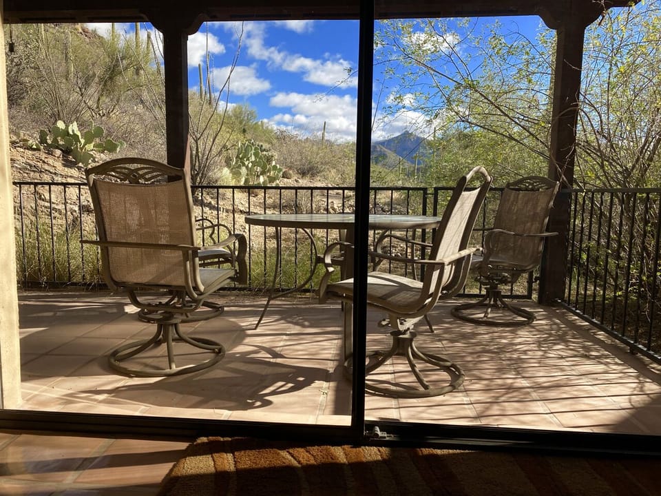 3rd deck off of great room, table for 4, gas grill outdoor dining. Sabino view
