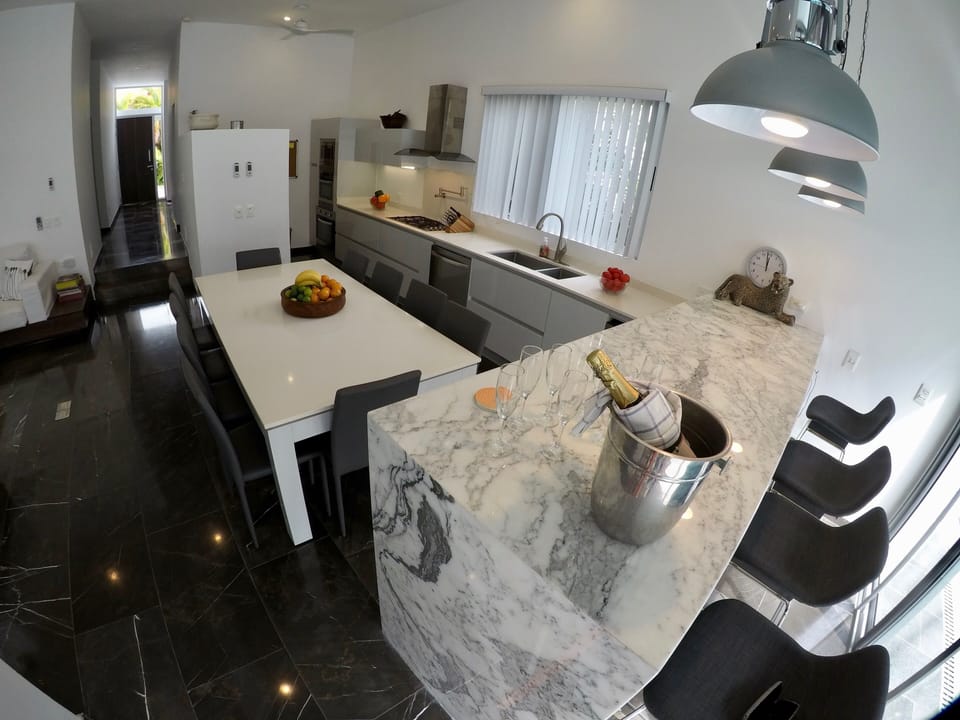 Casa Alma: Kitchen and Bar. Dining table moves to centre position for Dining.