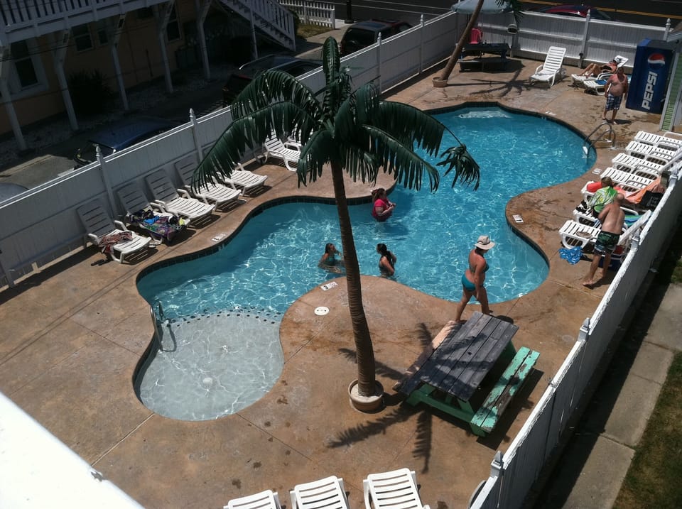Tropical pool open Memorial - Labor Day