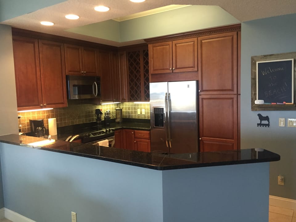 Modern kitchen, with view to the ocean as you cook.