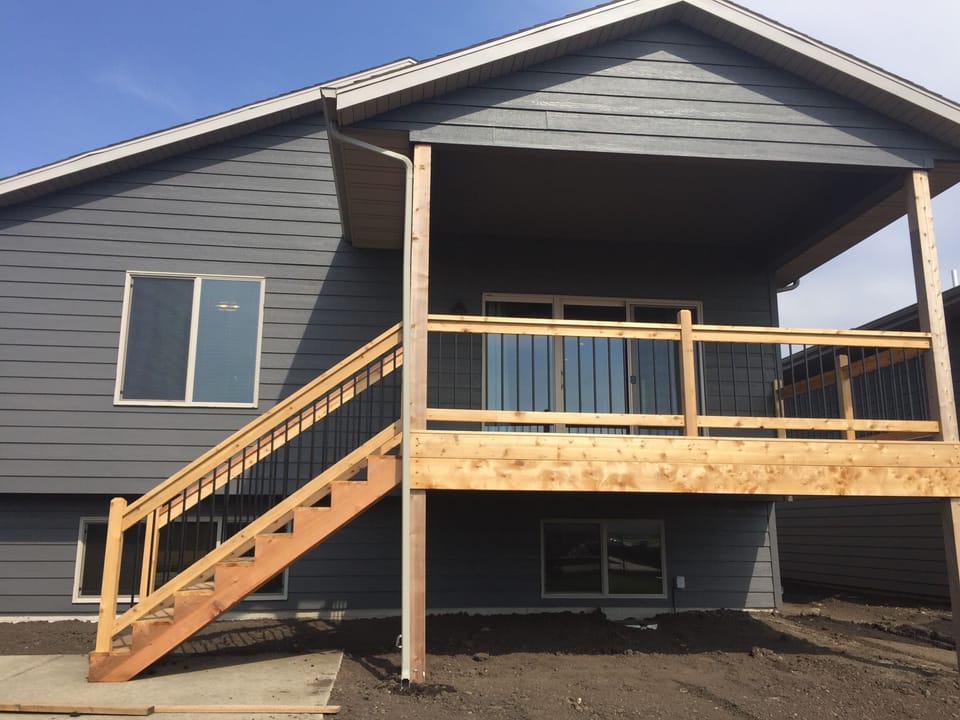 Watch the kids swim while you grill from the spacious covered deck.