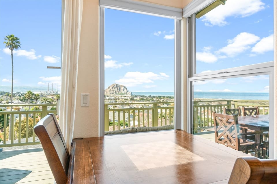 More views The patio door leads to a deck with a propane grill