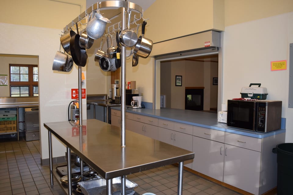 Kitchen opens up to commons/dining area. 
