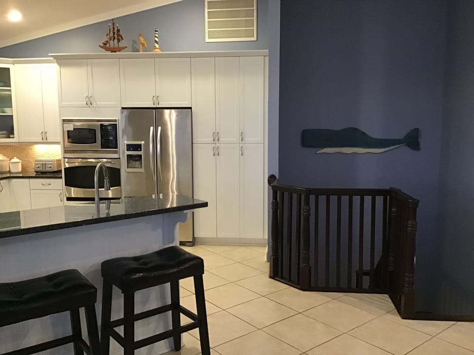 Kitchen and stairs 