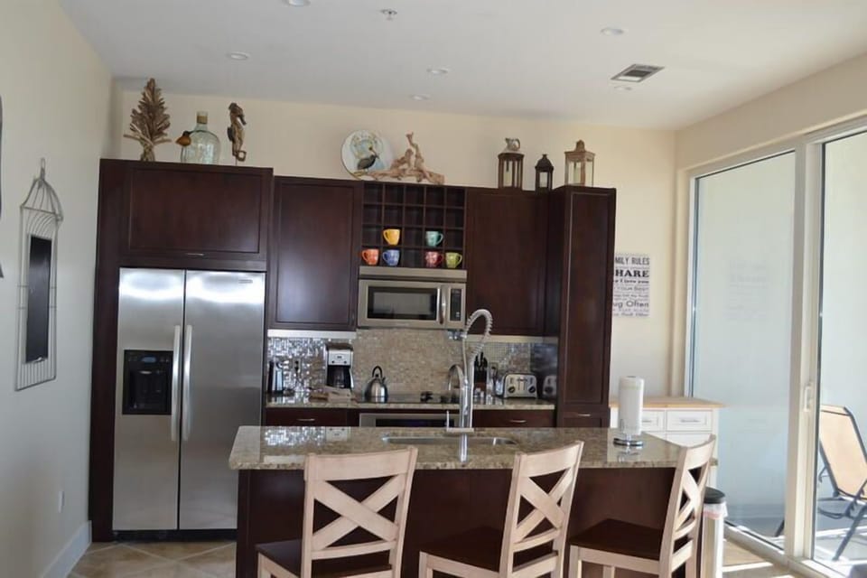 A very well stocked kitchen with breakfast bar - seats 3