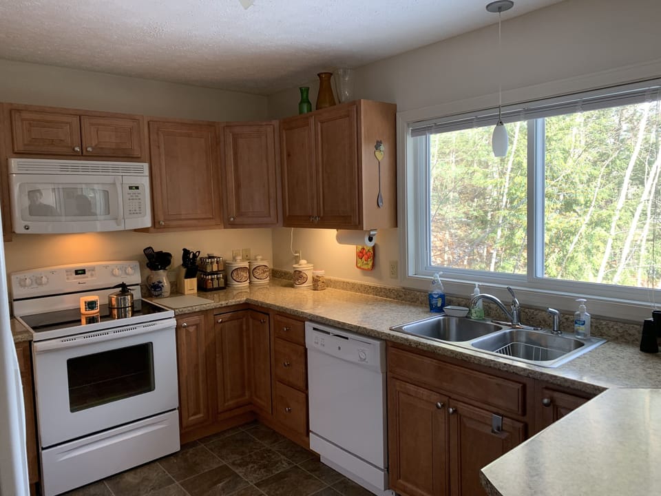 kitchen, windows overlook the lake