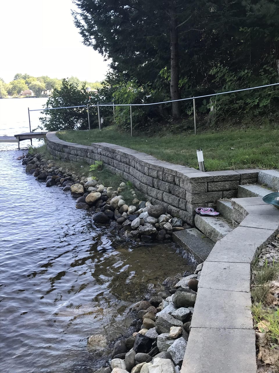 beach area, steps leading into the water