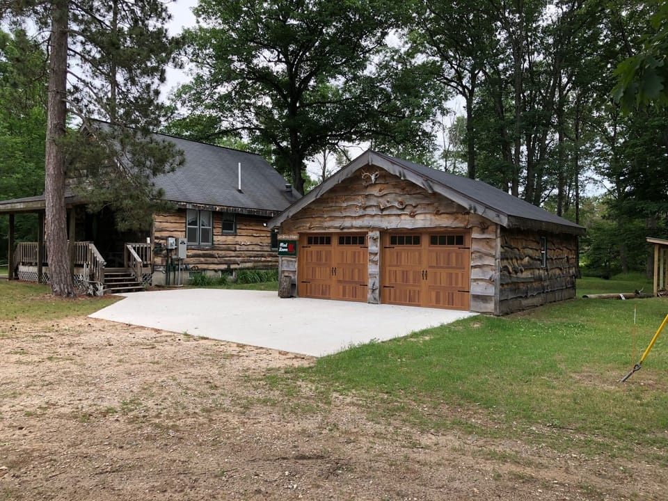 Front of house and mudroom / game room. 