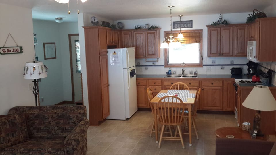 Kitchen/dining area. Twin pullout in Living room