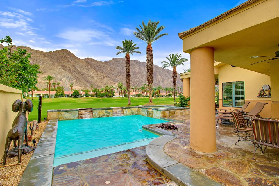 Another view of the pool and patio from the BBQ area.
