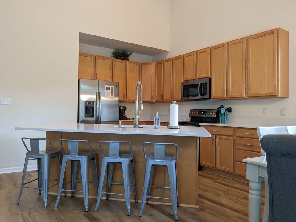 New kitchen island and new Quartz counter tops.