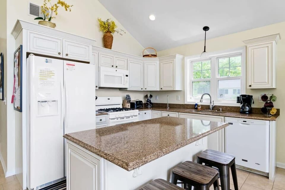 Kitchen area of great room in Sunset Shores Lake House