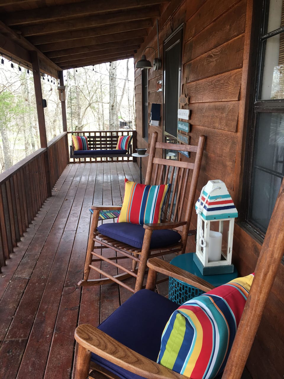 Welcome to Cedar Ridge. Relax on the porch after a fun filled day.