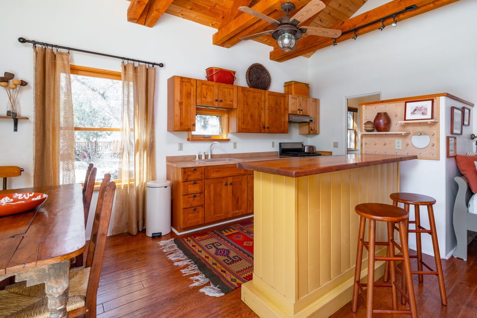 View of kitchen from living/dining areas. Ample room for food prep. 