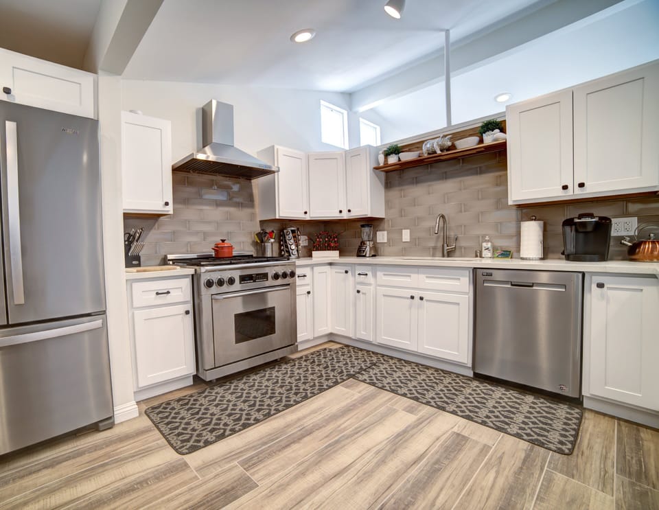 6 burner stove and pots/pans, dishes and silverware provided