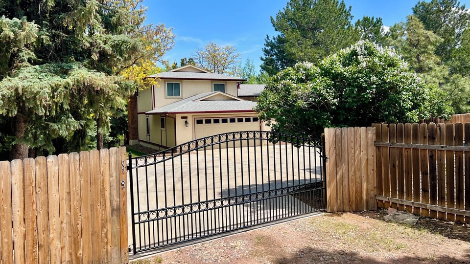 Private Colorado sanctuary begins here. Secure gated entrance,spacious driveway.