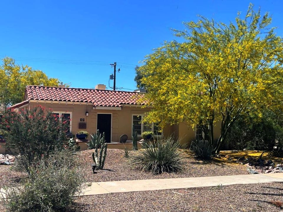 Front of The Wilshire House with a beautiful Palo Verde tree.