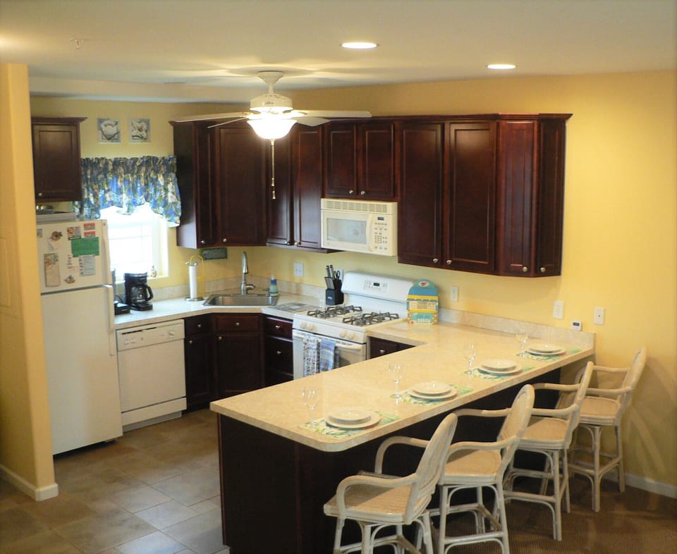 Large, fully stocked kitchen. 