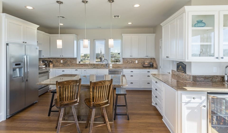 KITCHEN, ISLAND AND BAR AREA