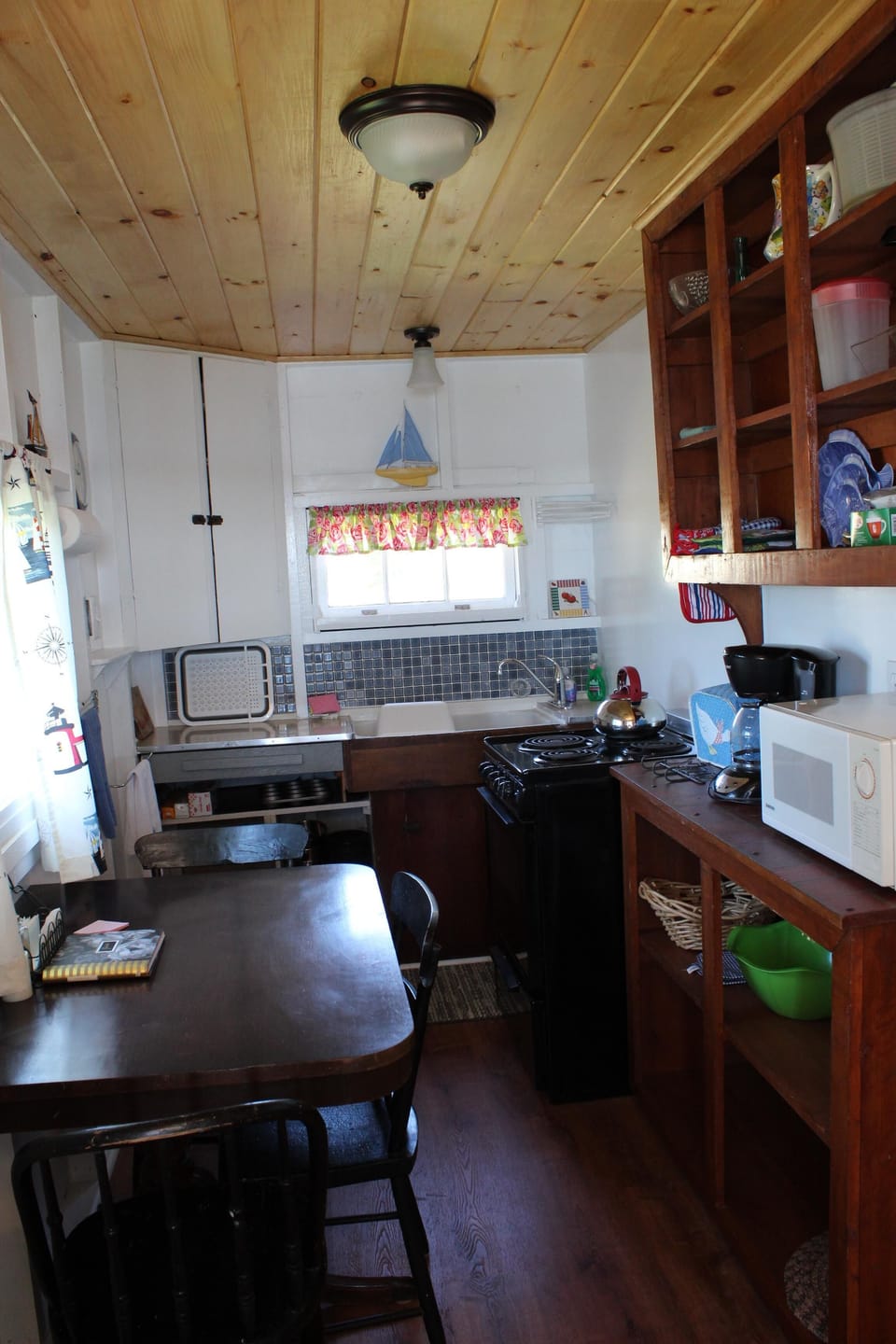 Kitchen with new ceiling. New floors throughout.